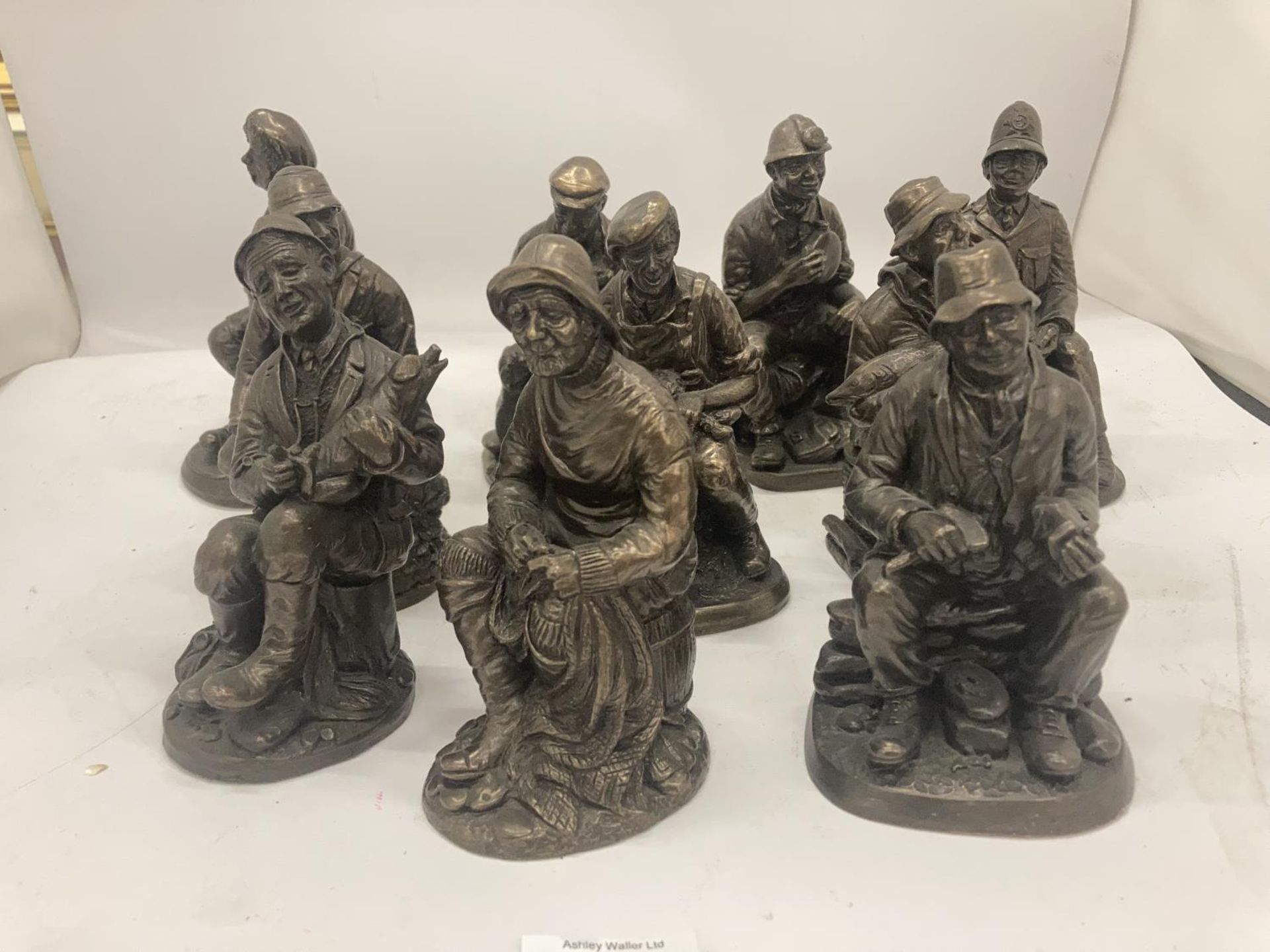 A COLLECTION OF VINTAGE STYLE FIGURES TO INCLUDE A BLACKSMITH, FISHERMAN, MINER, FARMER, ETC - 10 IN - Image 2 of 3