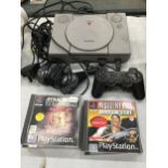 A SONY PLAYSTATION ONE WITH TWO CONTROLLERS AND FIVE GAMES TO INCLUDE STAR WARS THE PHANTOM