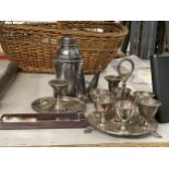A COLLECTION OF SILVER PLATED ITEMS TO INCLUDE COCKTAIL SHAKER, EGG CUP STAND ETC