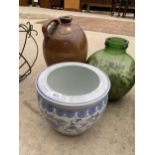 A LARGE STONEWARE FLAGGON, A GREEN GLASS CARBOUY AND A BLUE AND WHITE JARDINAIRE