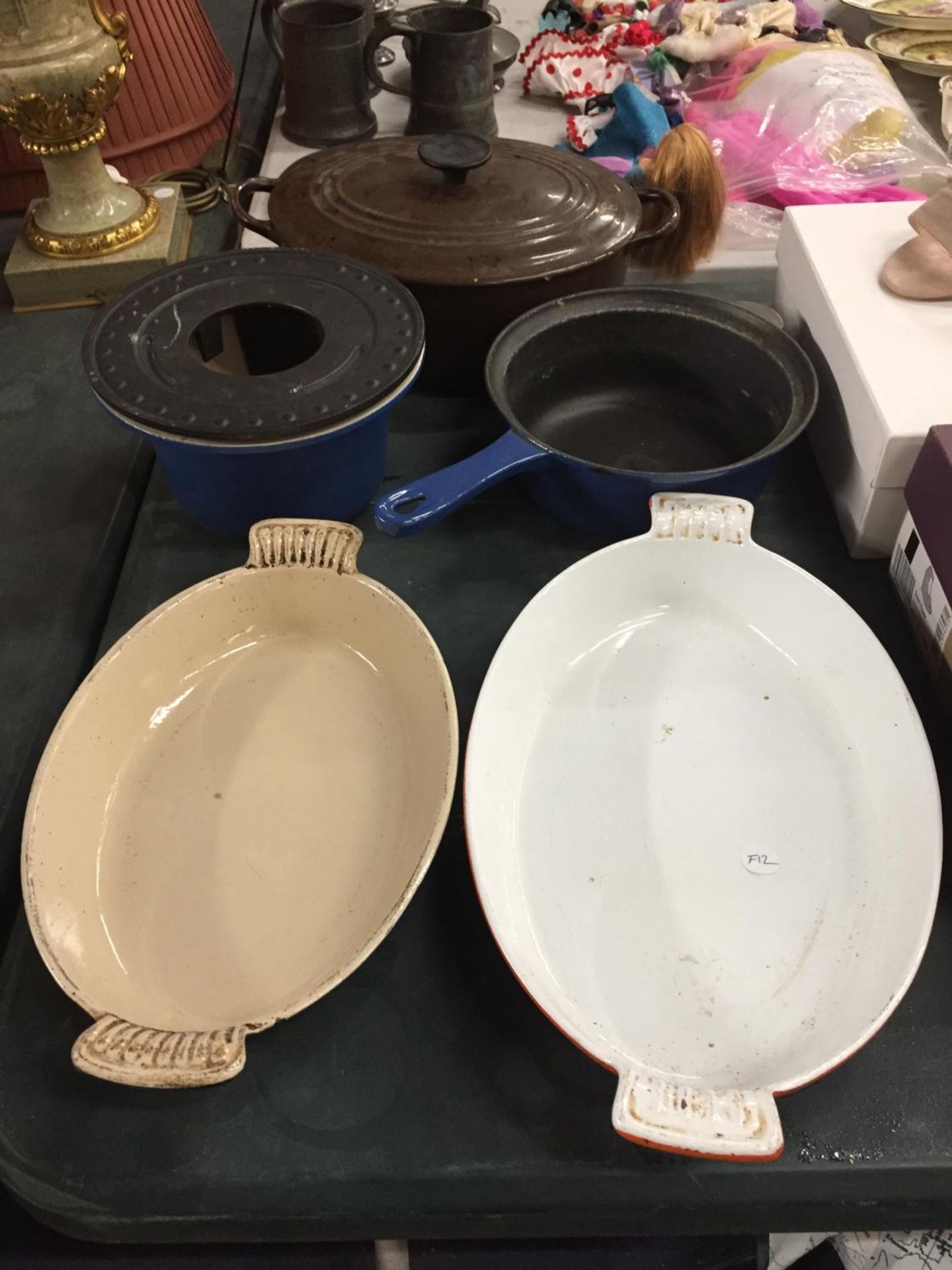 FOUR LE CREUSET COOKING DISHES AND PANS PLUS ONE OTHER