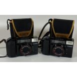 TWO CASED CANON SURE SHOT 38MM CAMERAS