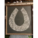 A FRAMED VICTORIAN LACE HORSESHOE SHAWL