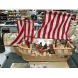 A CHILDREN'S LARGE WOODEN GALLEON TOY WITH FIGURES