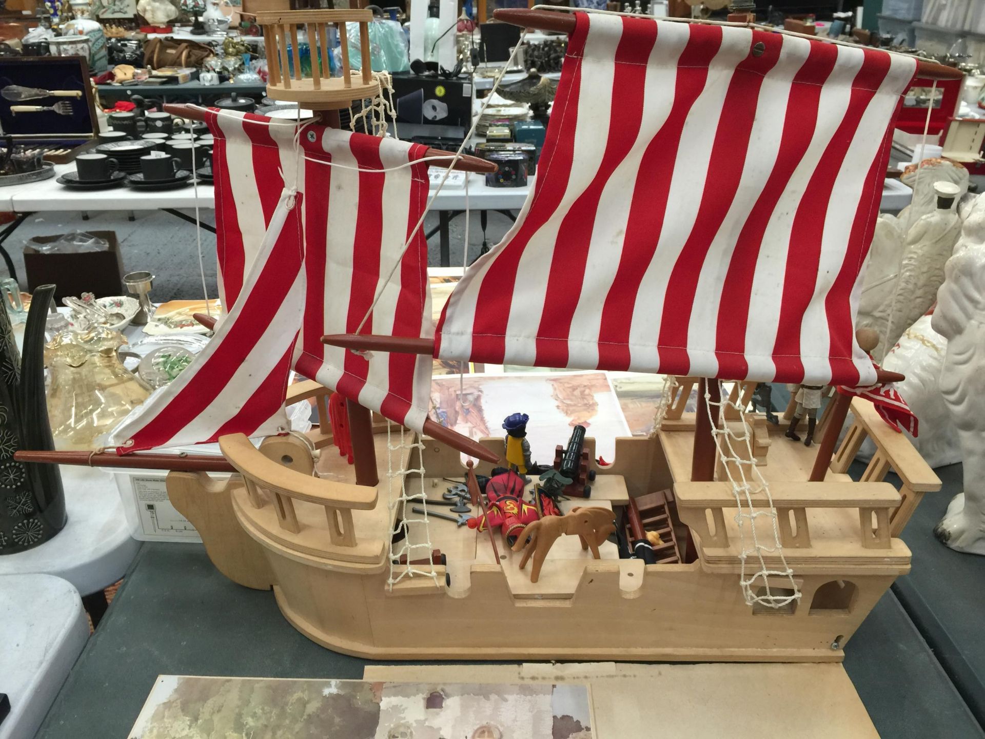 A CHILDREN'S LARGE WOODEN GALLEON TOY WITH FIGURES