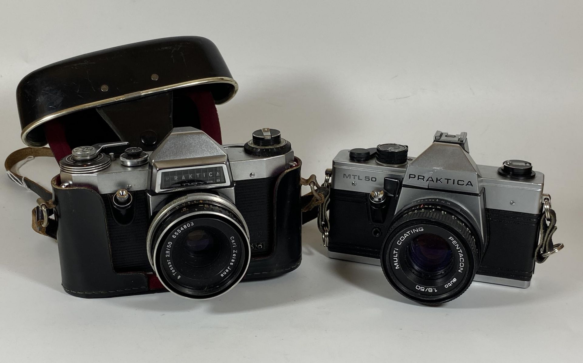 TWO VINTAGE PRAKTICA CAMERAS - CASED PRAKTICA NOVA B FITTED WITH CARL ZEISS JENA TESSAR 50MM LENS