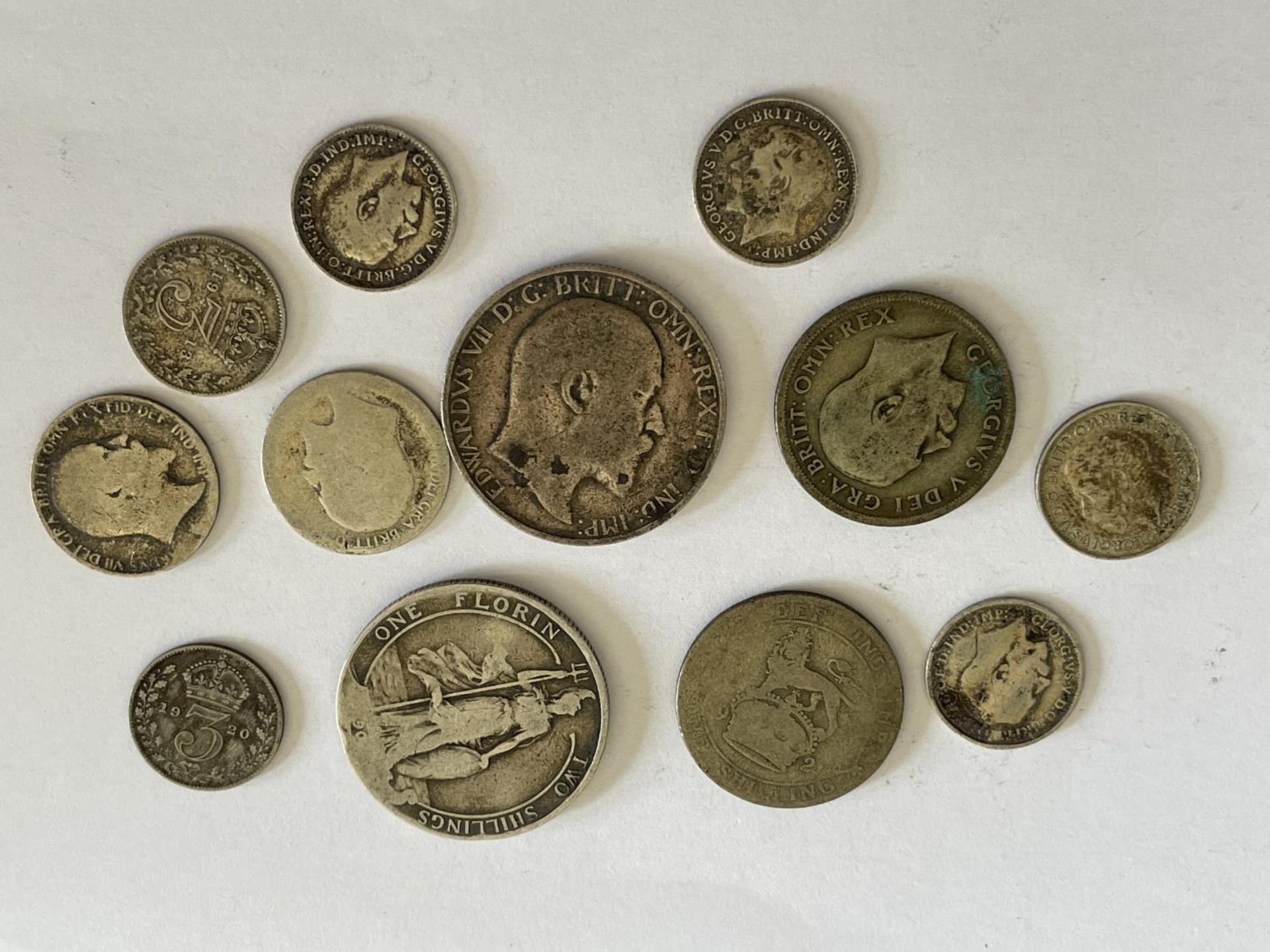 TWELVE VARIOUS SILVER COINS