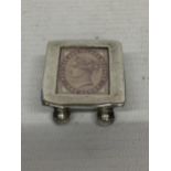 A SILVER TRINKET BOX WITH AN INLAID PENNY STAMP