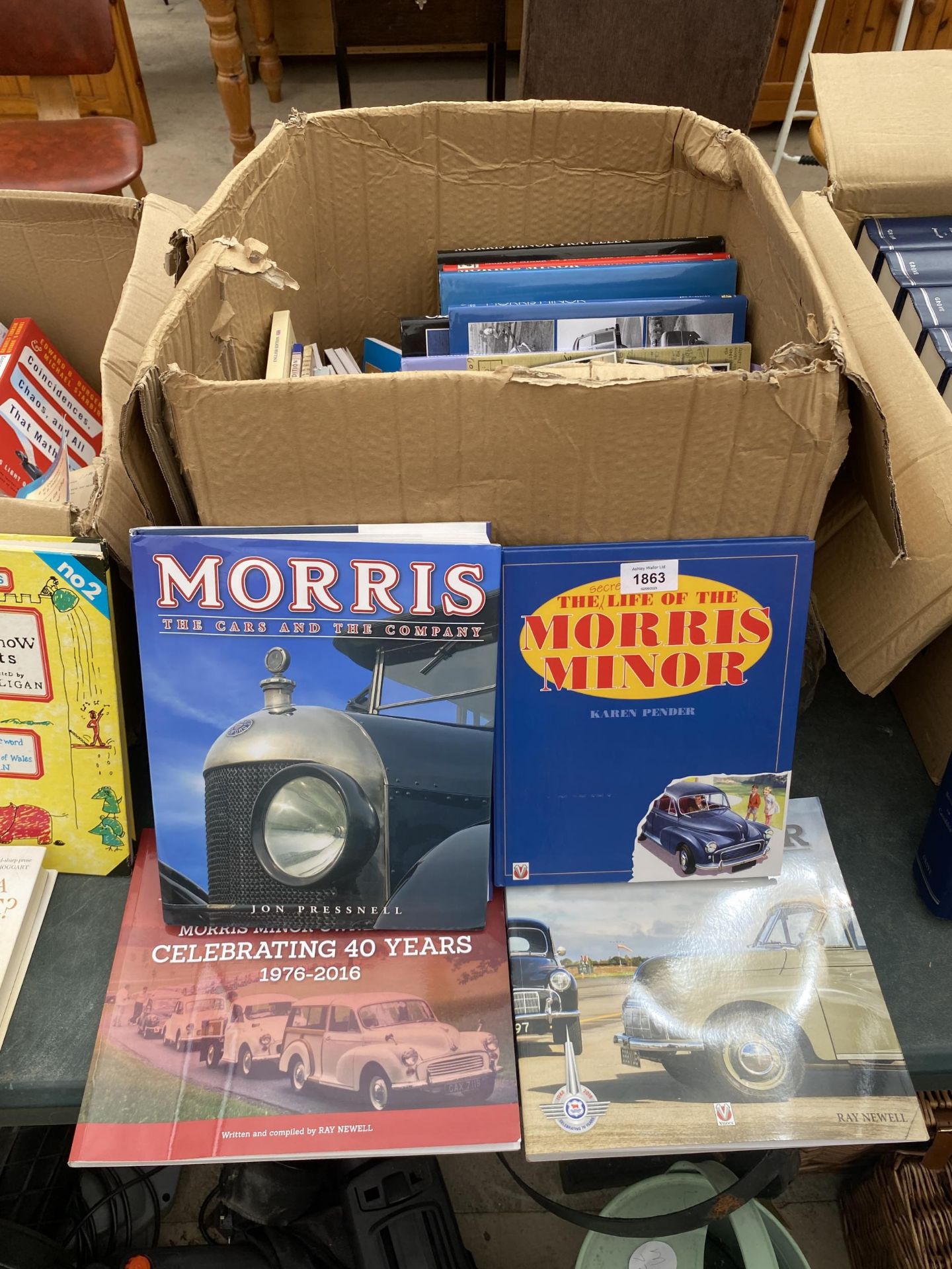 A LARGE ASSORTMENT OF BOOKS ON MORRIS MINORS
