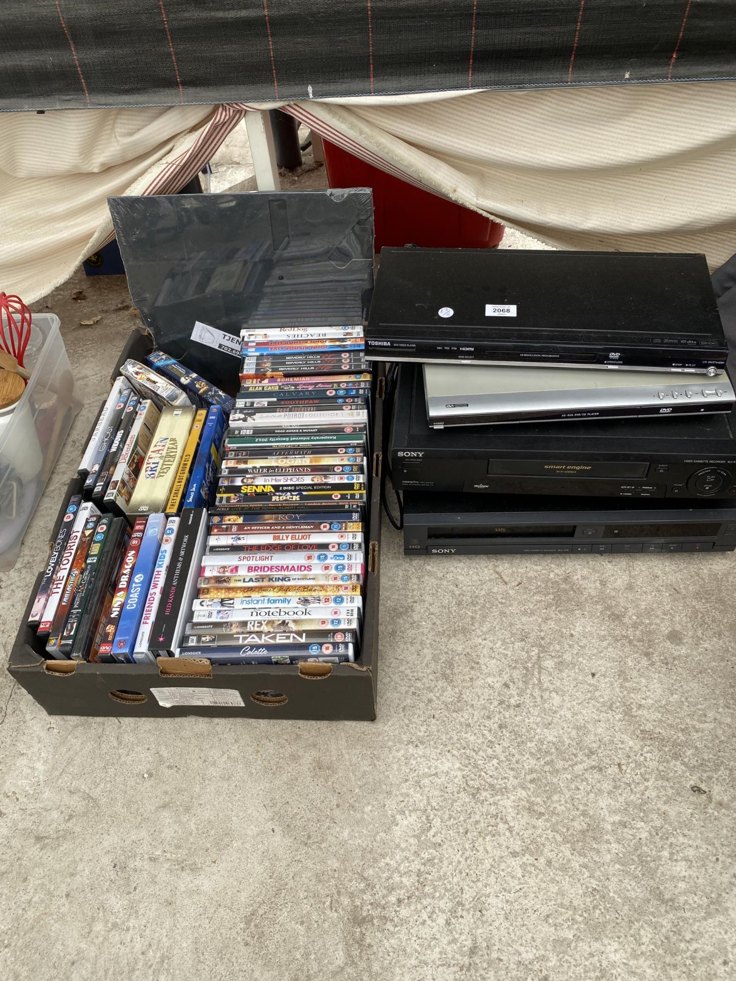 FOUR ELECTRICAL ITEMS TO INCLUDE TWO DVD PLAYERS, TWO VHS PLAYERS AND A COLLECTION OF DVDS