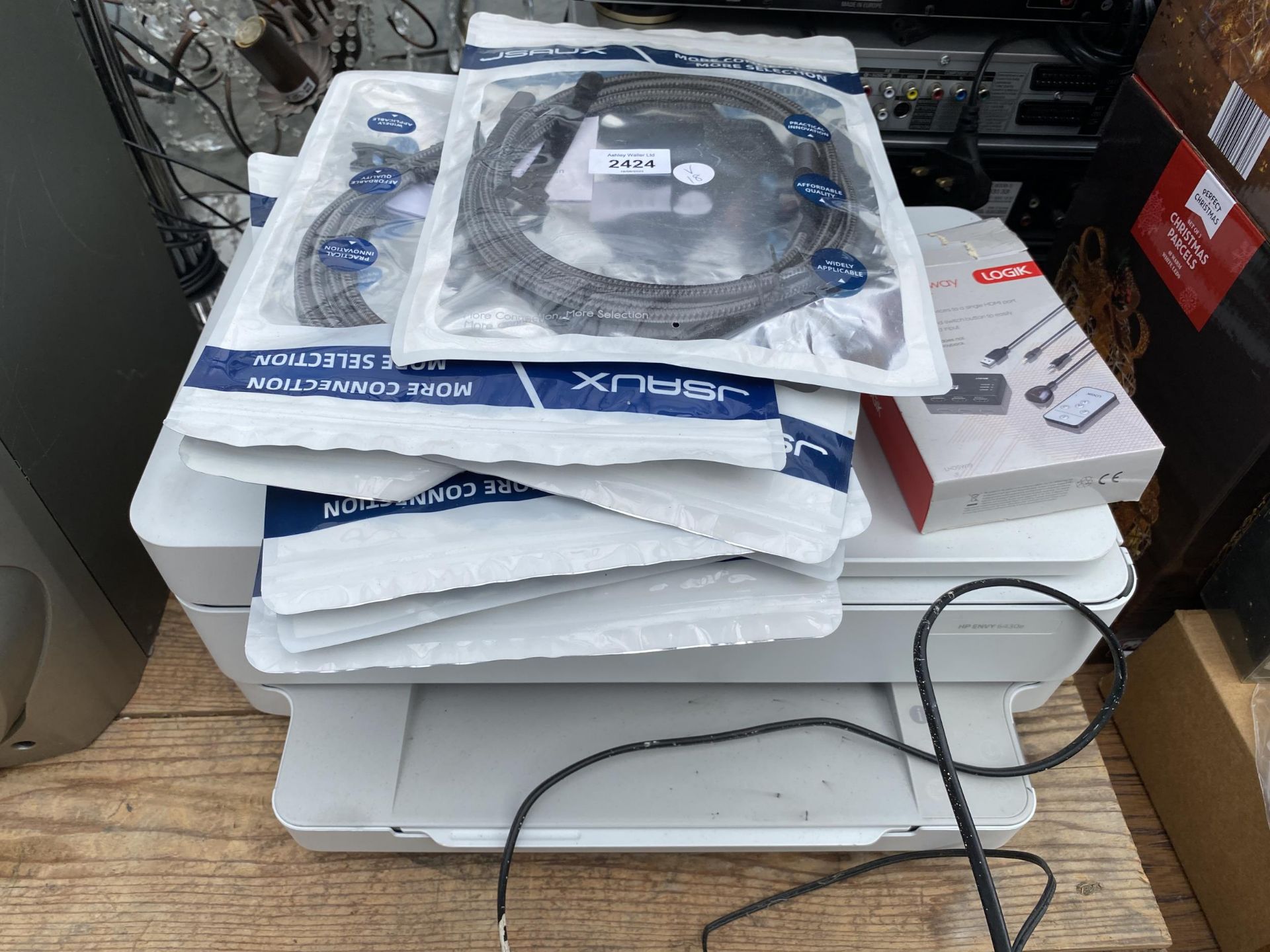 A HP PRINTER AND A QUANTITY OF NEW JSAUX HDMI CABLES