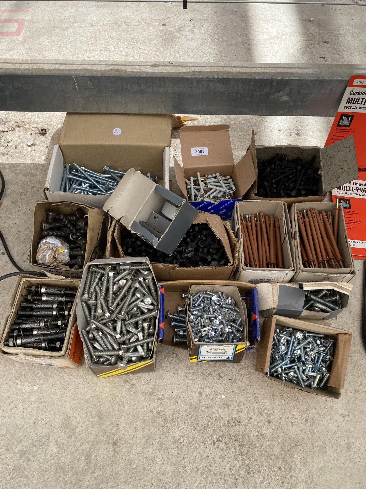 THIRTEEN BOXES OF AS NEW WALL FIXINGS, NUTS AND BOLTS, ETC