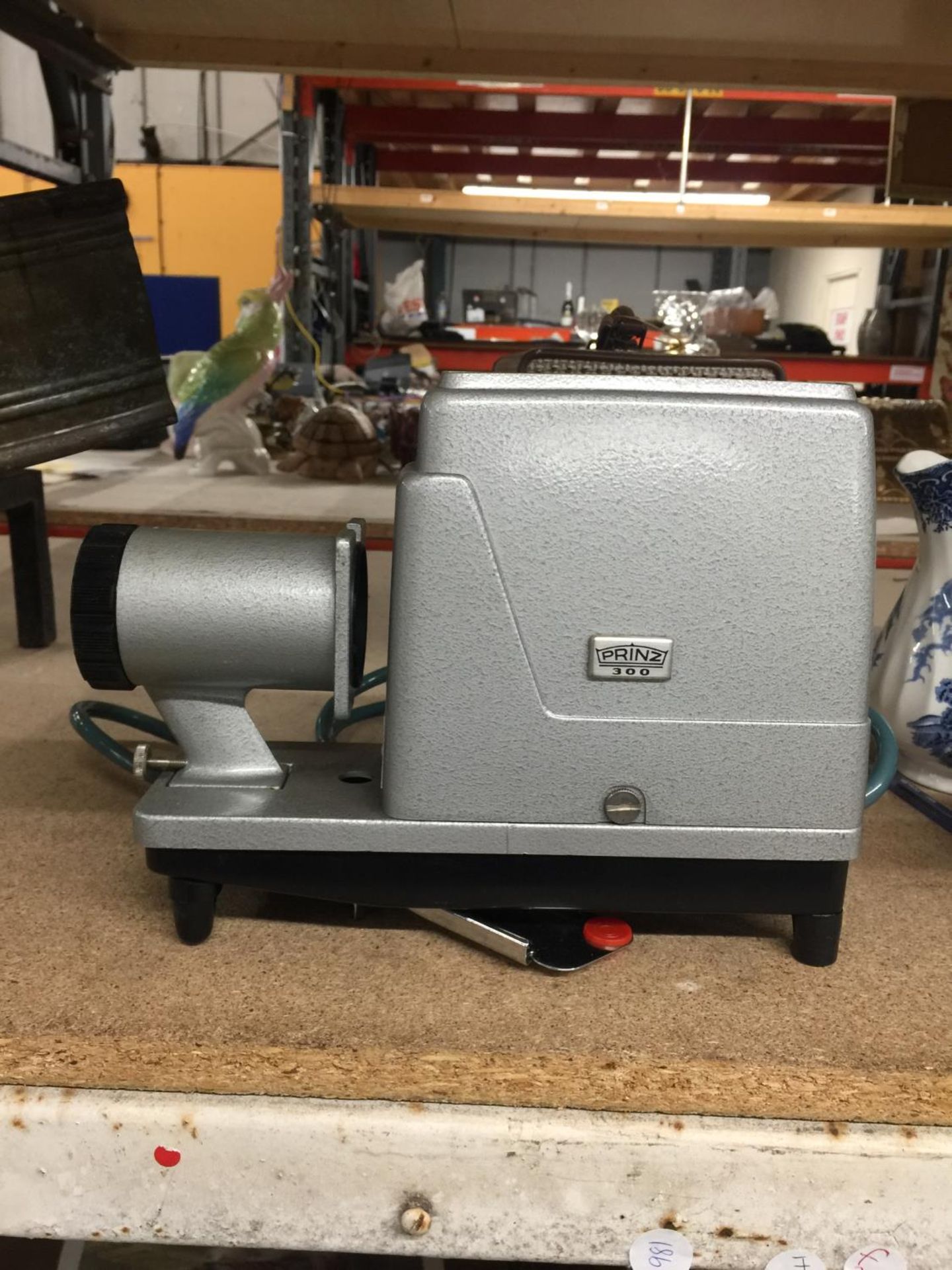 A VINTAGE PRINZ 300 PROJECTOR AND CASE