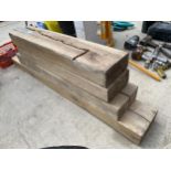 FOUR VINTAGE WOODEN BEAM BLOCKS