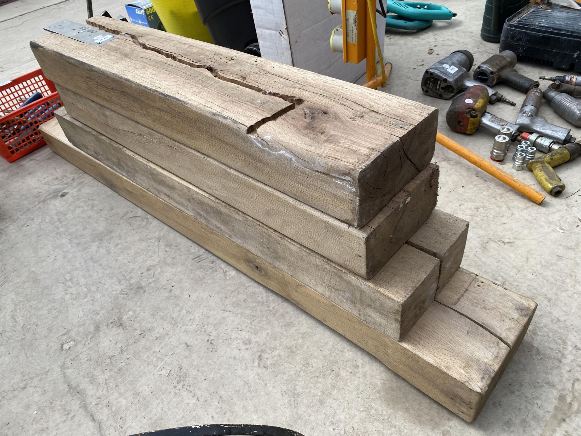 FOUR VINTAGE WOODEN BEAM BLOCKS