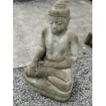 A LARGE RECONSTITUTED STONE BUDDHIST DIETY FIGURE - HEIGHT 107 CM, DEPTH 48 CM