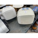 TWO PLUG IN DELONGHI DEHUMIDIFERS