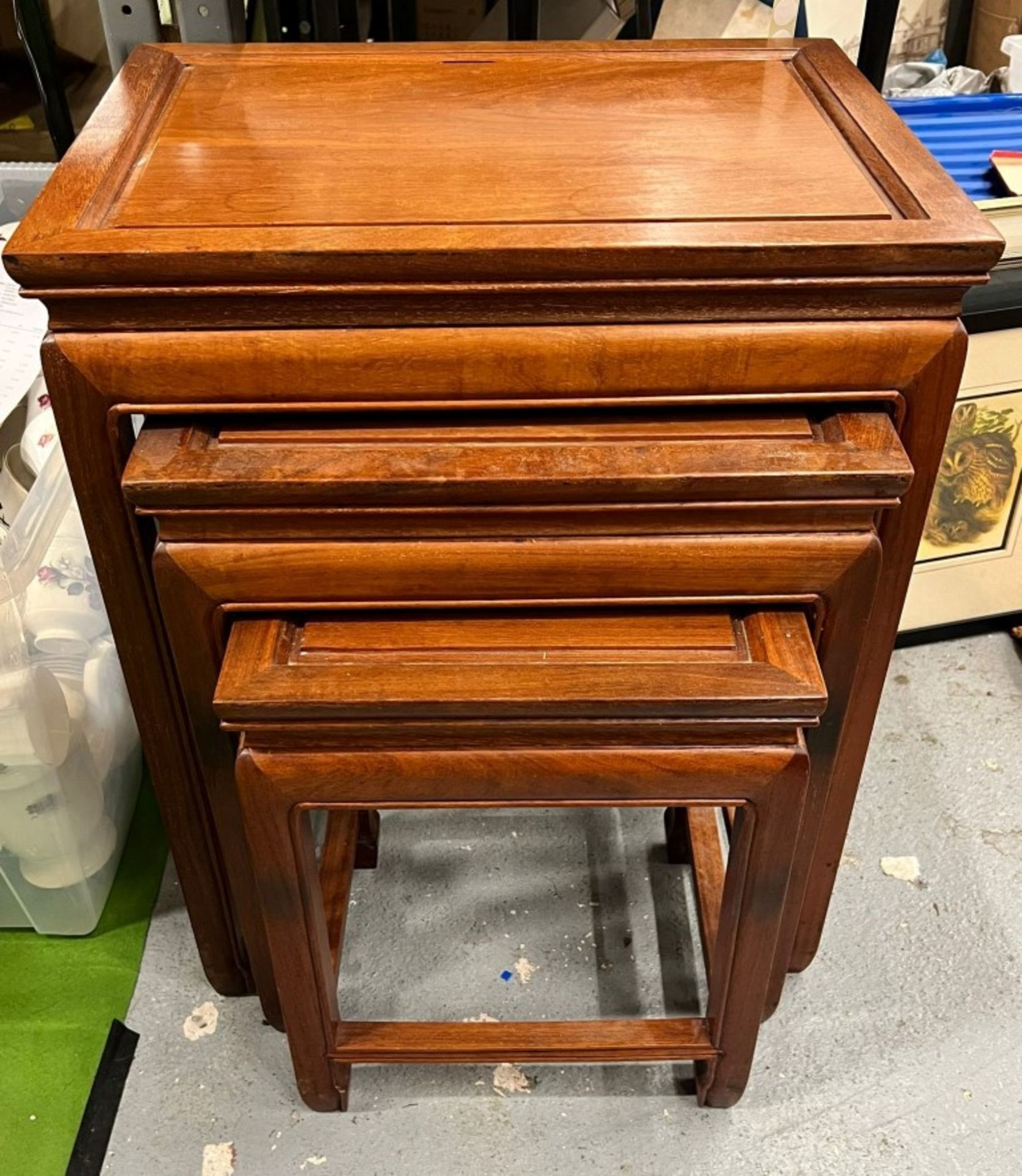 A VINTAGE NEST OF THREE ORIENTAL YEW WOOD TABLES