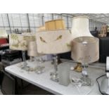 A COLLECTION OF TABLE LAMPS WITH DECORATIVE SHADES