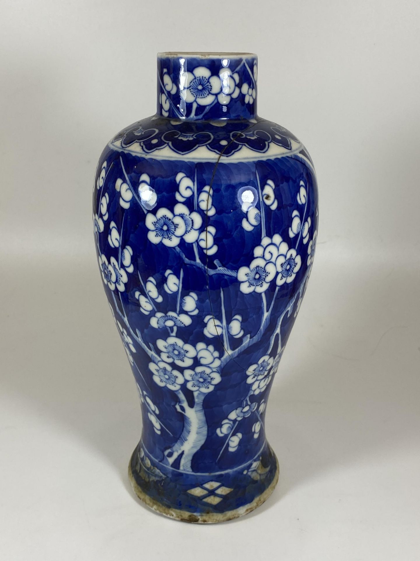 A LARGE LATE 19TH CENTURY CHINESE QING BLUE AND WHITE PRUNUS BLOSSOM BALUSTER FORM VASE, FOUR - Image 3 of 7
