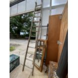 A LARGE DOUBLE LADDER, 18 RUNG