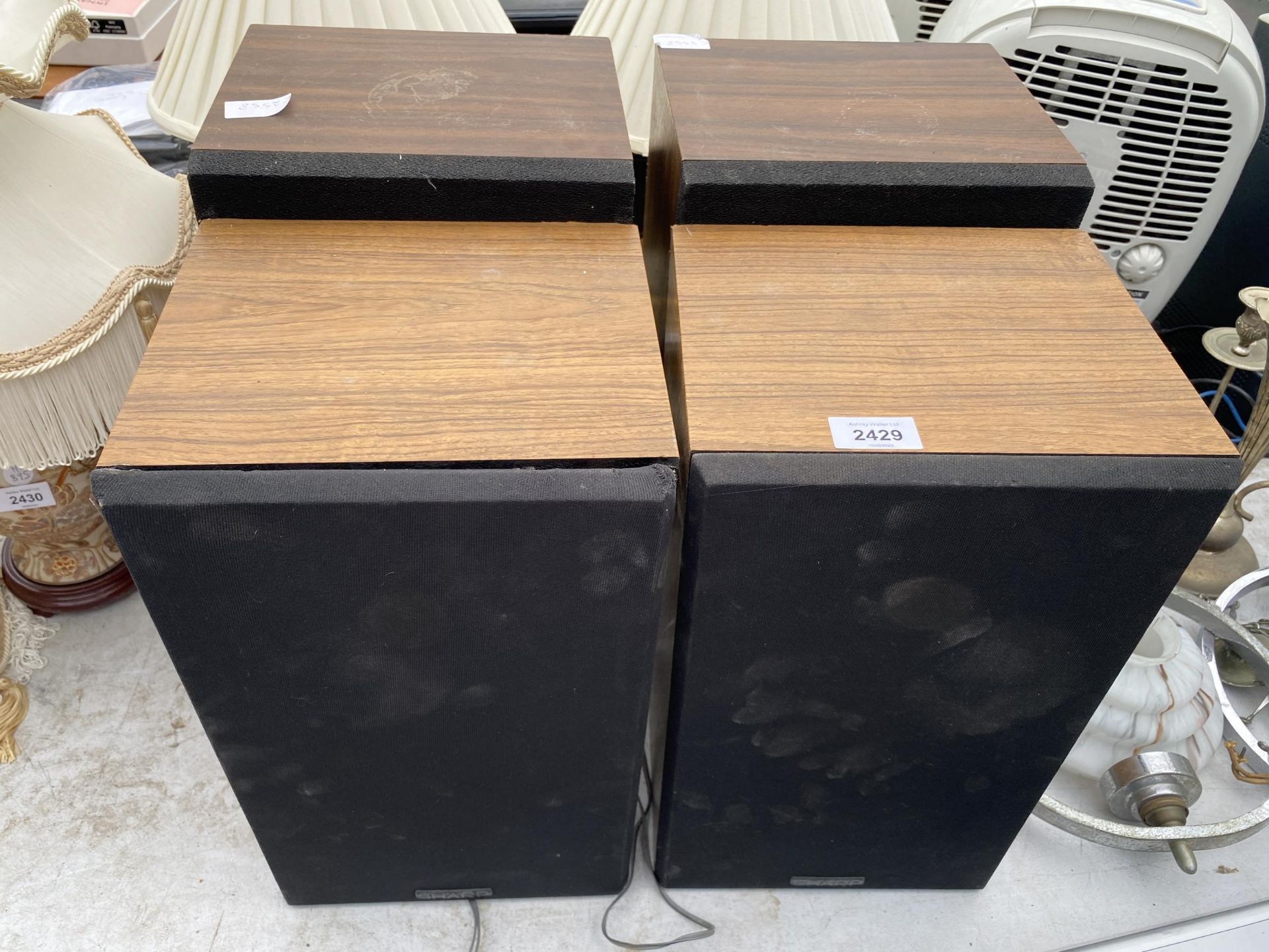 A PAIR OF WOODEN CASED AIWA SPEAKERS AND A PAIR OF WOODEN CASED SHARP SPEAKERS
