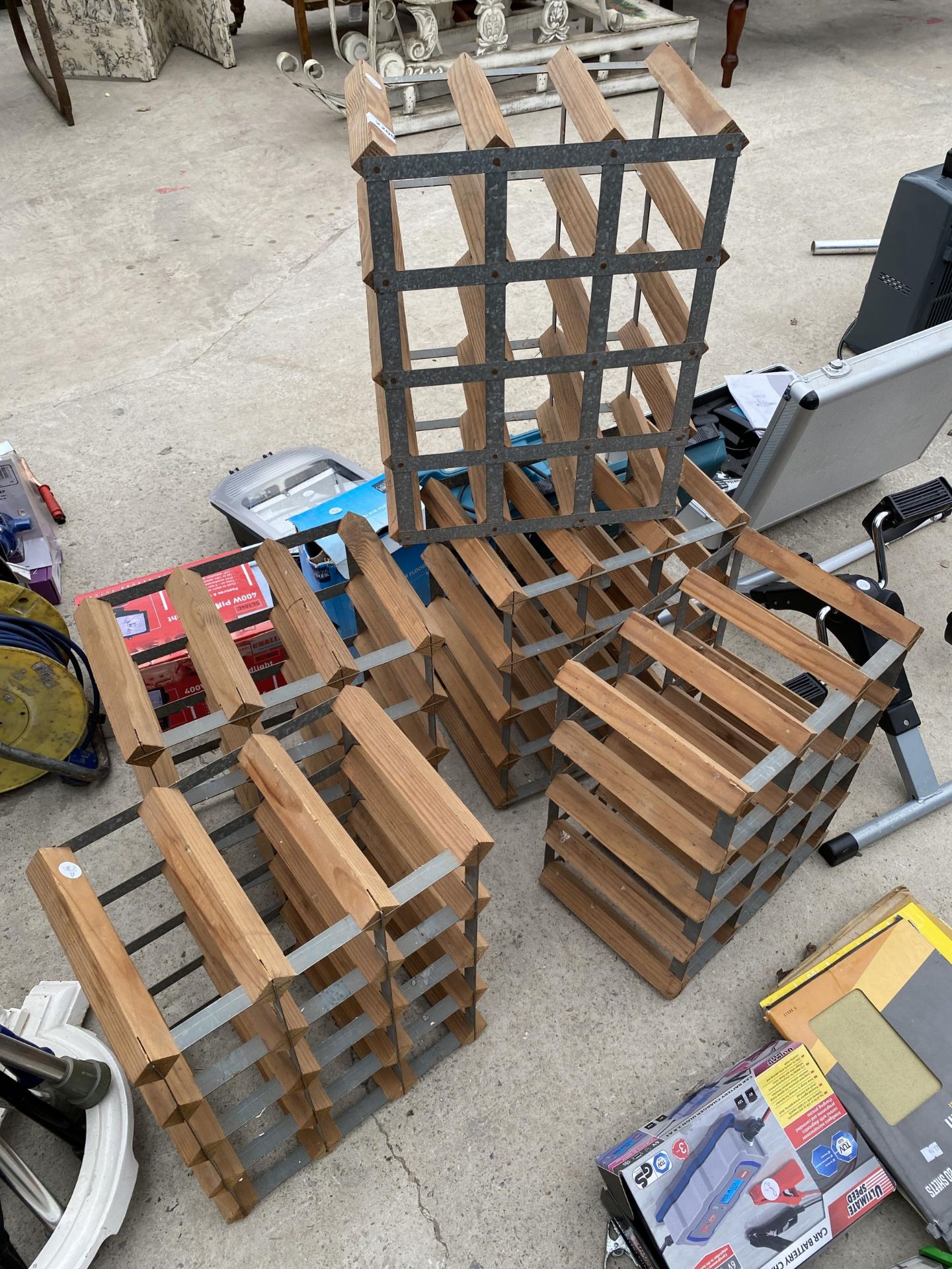 FIVE WOODEN AND METAL BOUND WINE RACKS EACH ONE HOLDS 12 BOTTLES