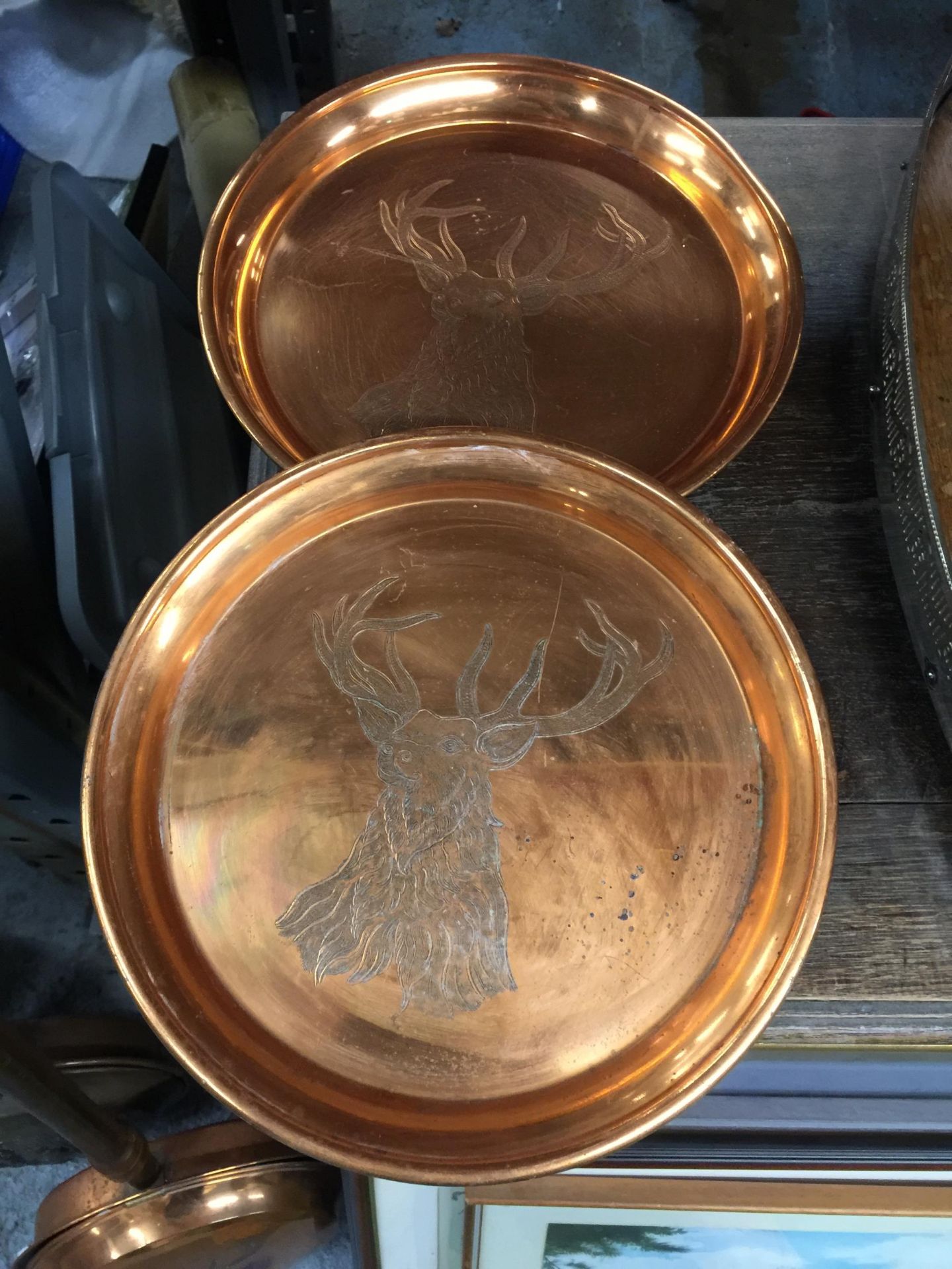 TWO COPPER STAG DESIGN BOWLS