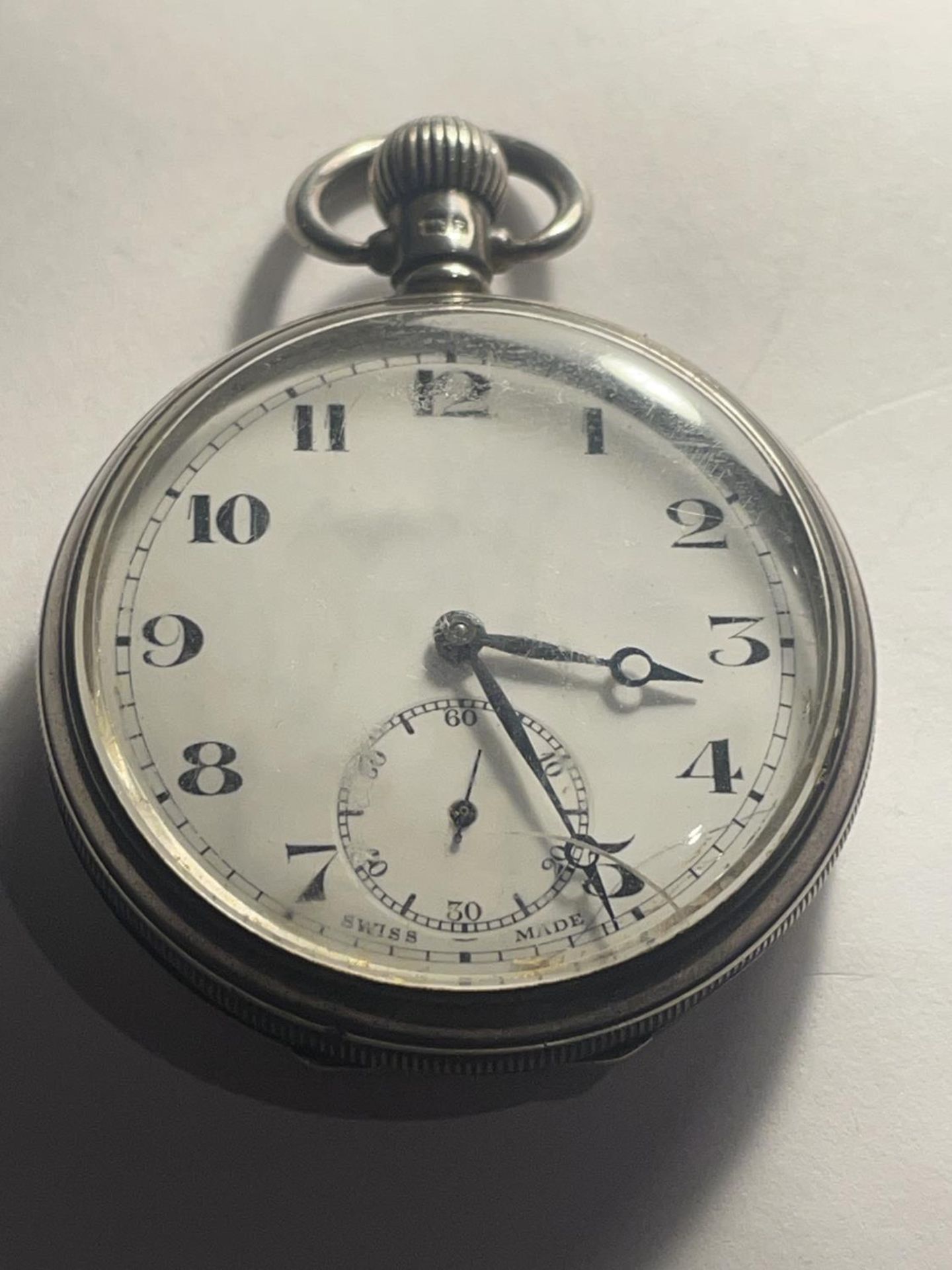 A HALLMARKED BIRMINGHAM SILVER OPEN FACED POCKET WATCH WITH CROWN WINDER SEEN WORKING BUT NO