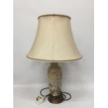 A COBRIDGE STONEWARE DAISY FIELD PATTERN TABLE LAMP AND SILK SHADE