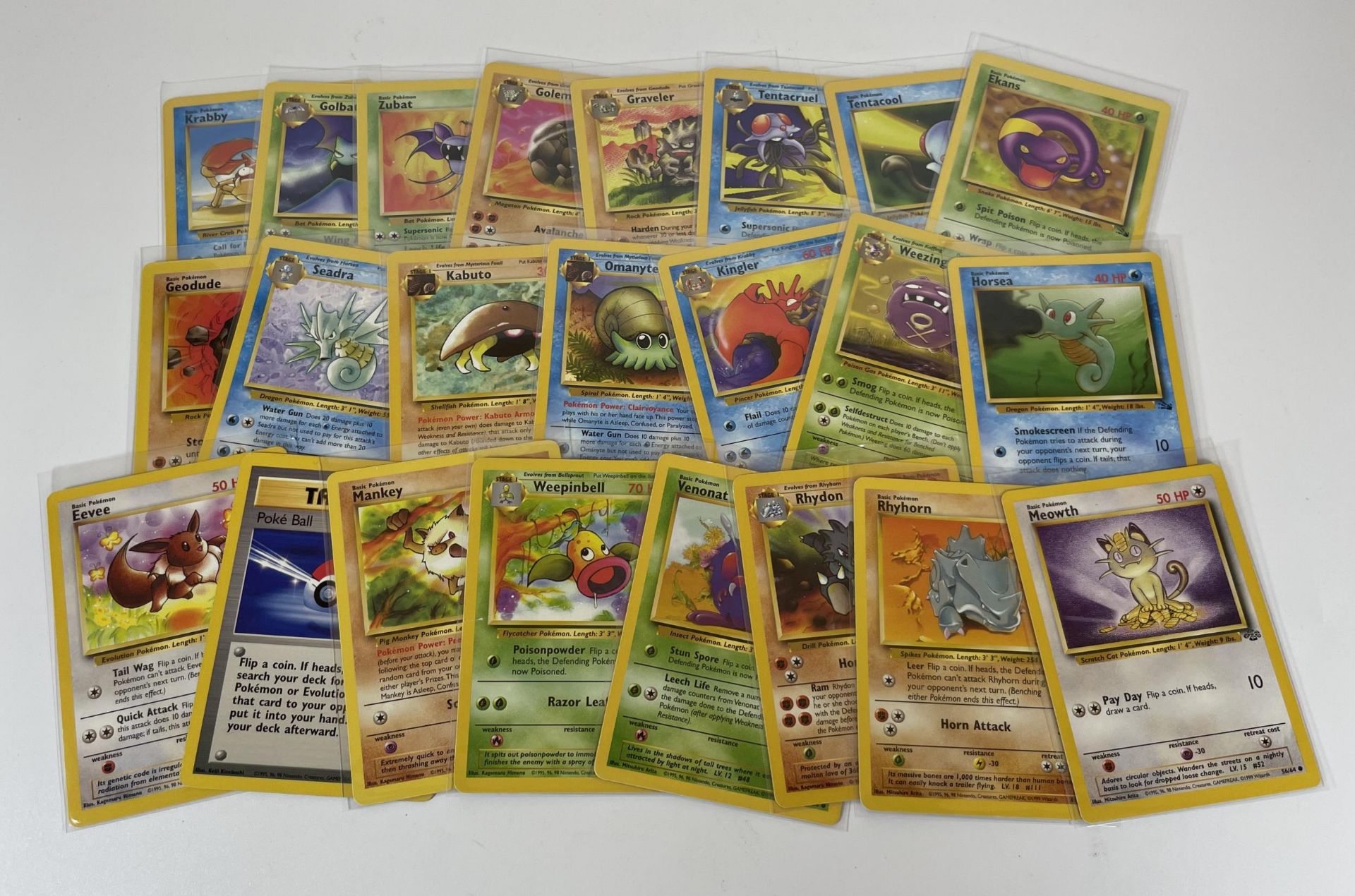 A GROUP OF WOTC FOSSIL & JUNGLE SET POKEMON CARDS