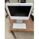 A RETRO APPLE IMAC WITH KEYBOARD