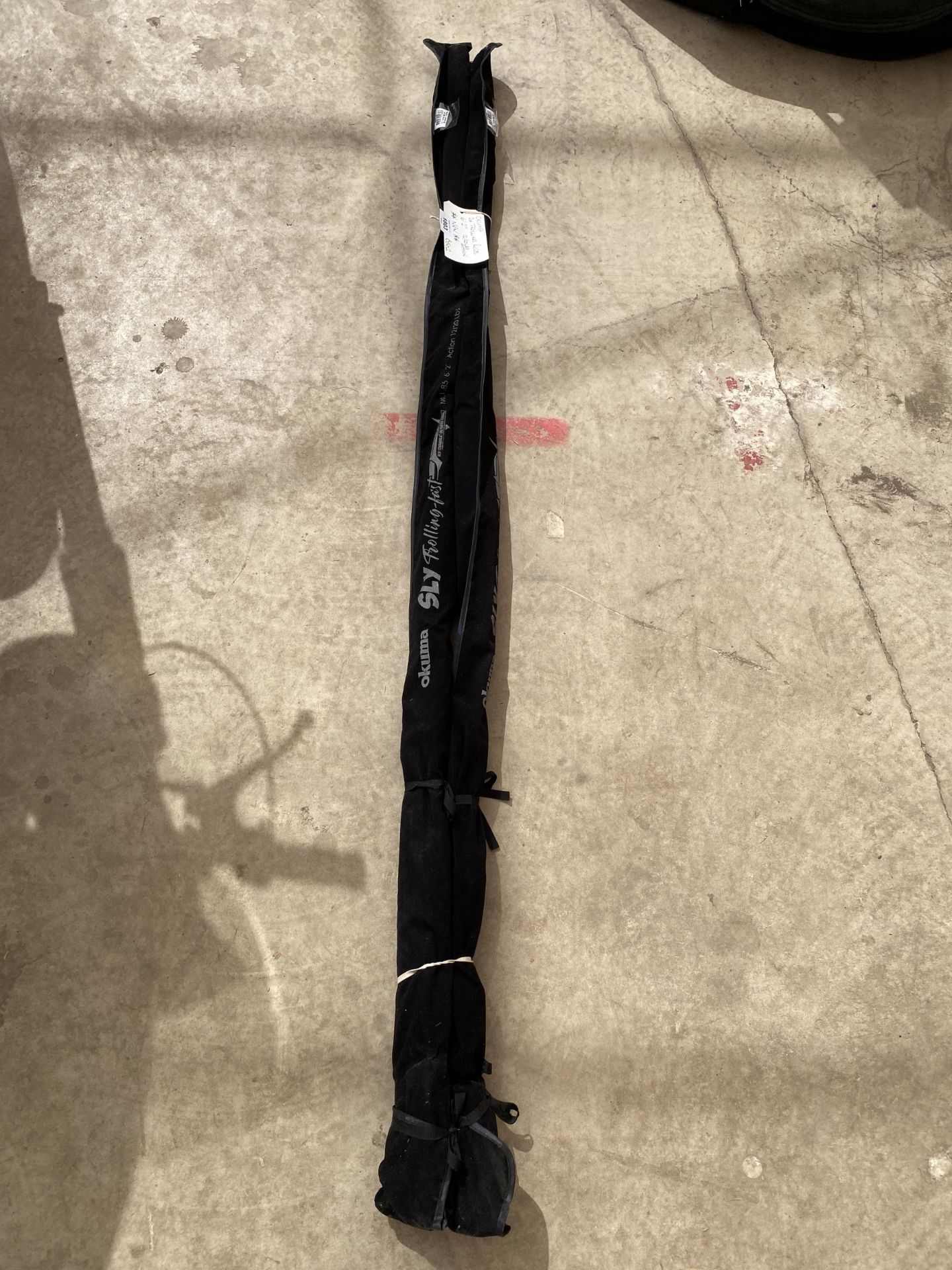 TWO NEW TROLLING FISHING RODS, OKUMA 6'2" 12/20 LBS ACTION