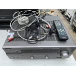 A YAMAHA AV AMPLIFIER VIDEO PLAYER AND REMOTE