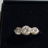 A 9CT GOLD RING WITH 3 CZ STONES,WEIGHT 2.4G, SIZE N