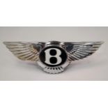 A BENTLEY ILLUMINATED FLYING 'B' BOOT BADGE