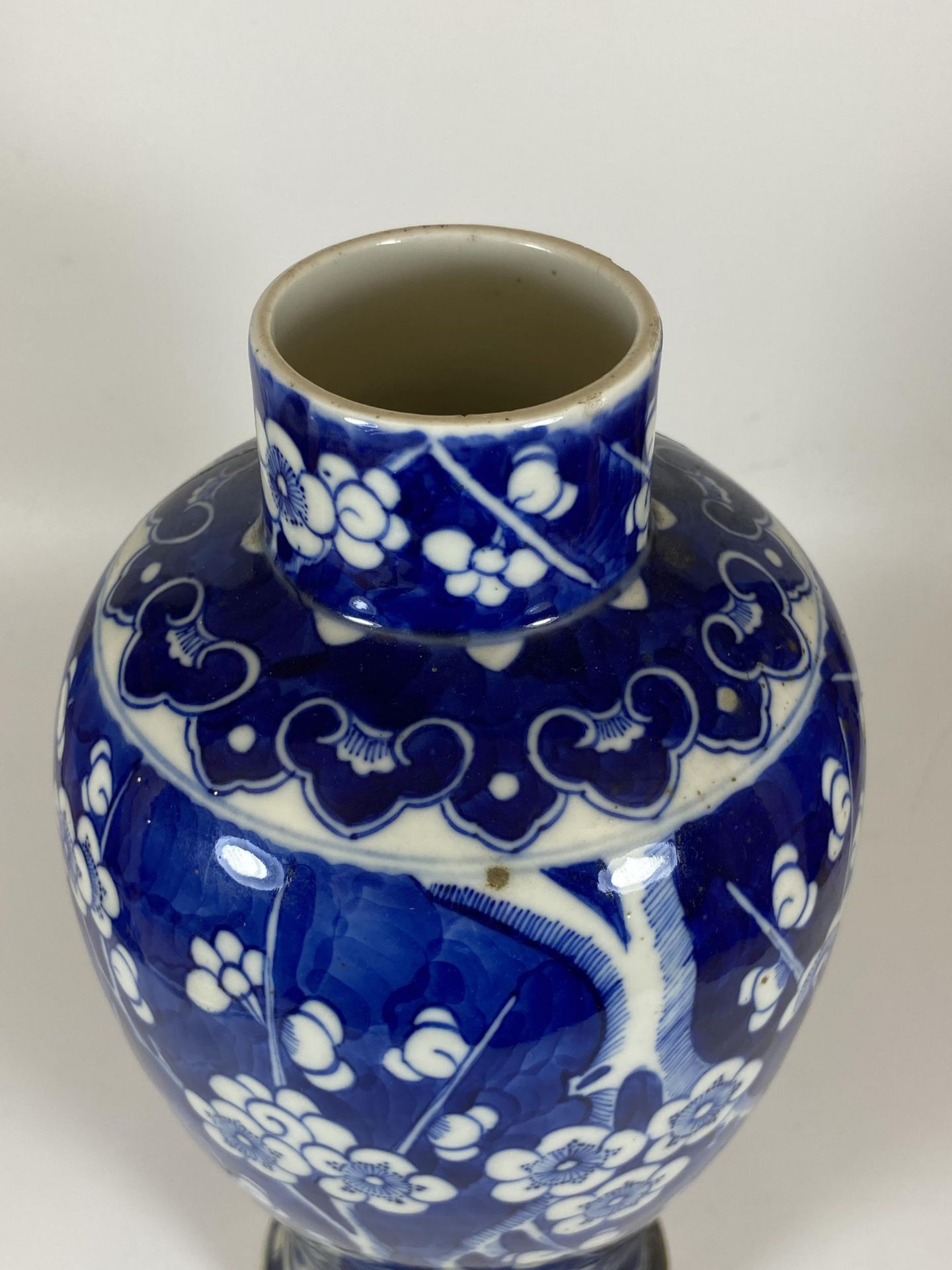 A LARGE LATE 19TH CENTURY CHINESE QING BLUE AND WHITE PRUNUS BLOSSOM BALUSTER FORM VASE, FOUR - Image 2 of 7
