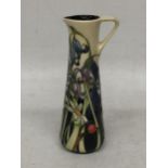 A MOORCROFT POTTERY FLORAL JUG, DATED 2005, (HANDLE A/F)