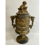 A 19TH CENTURY BRONZE PEDESTAL URN WITH NEO-CLASSICAL RELIEF DESIGN ON FLUTED BASE WITH CHERUB