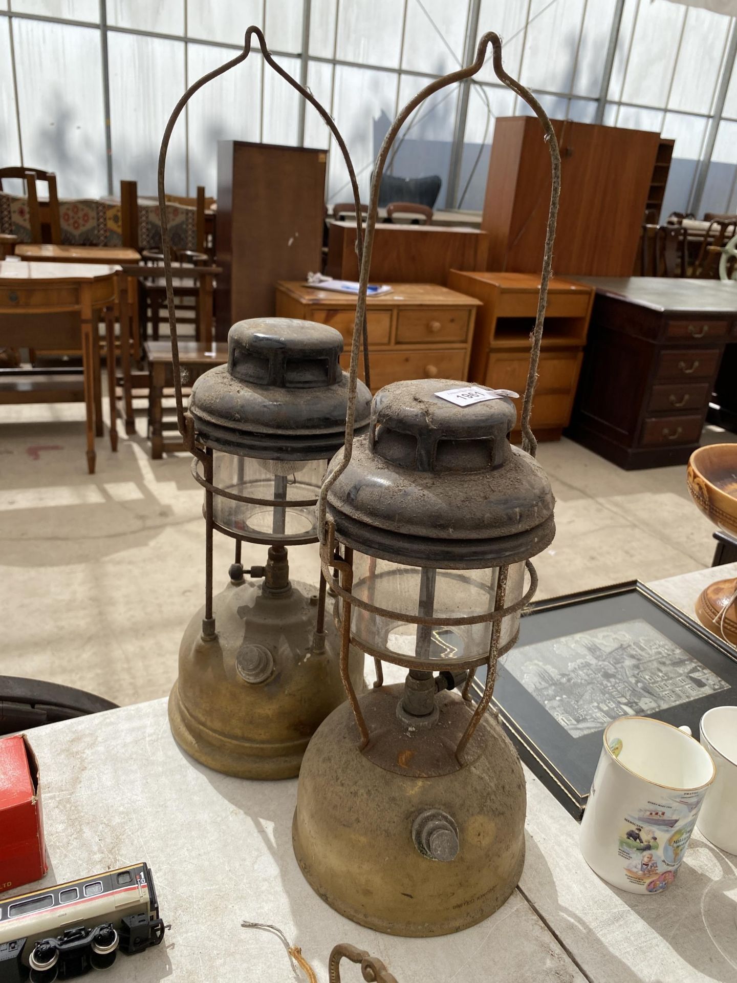 A PAIR OF VINTAGE TILLEY LAMPS