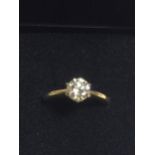 AN 18CT GOLD DIAMOND SOLITAIRE WITH 1 CARAT (APPROX) DIAMOND, SIZE K AND A HALF