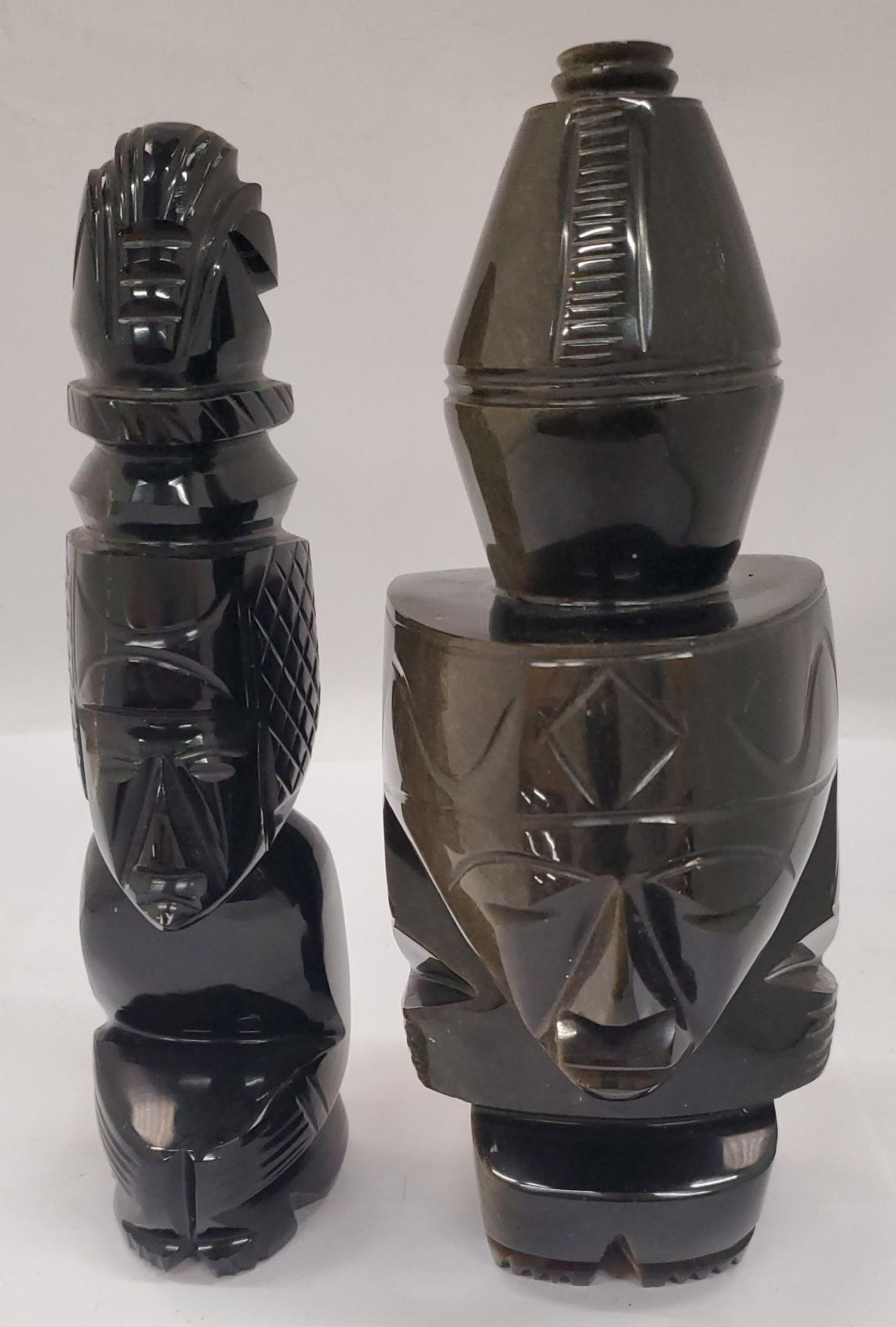 TWO BLACK OBSIDIAN AZTEC STYLE FIGURES, HEIGHT 22CM