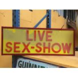 A 'LIVE SEX SHOW' ILLUMINATED BOX SIGN