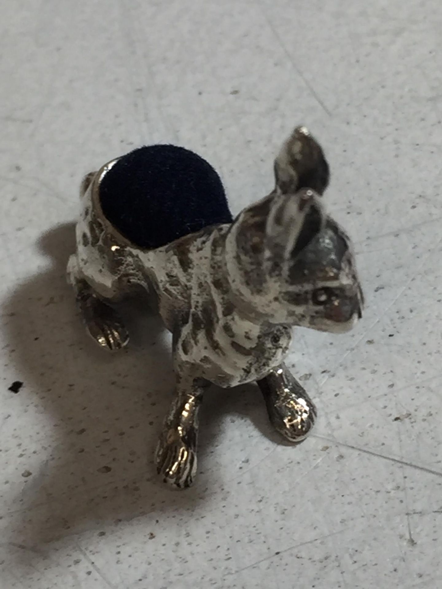 A SILVER PIN CUSHION IN THE SHAPE OF A RABBIT - Image 2 of 3
