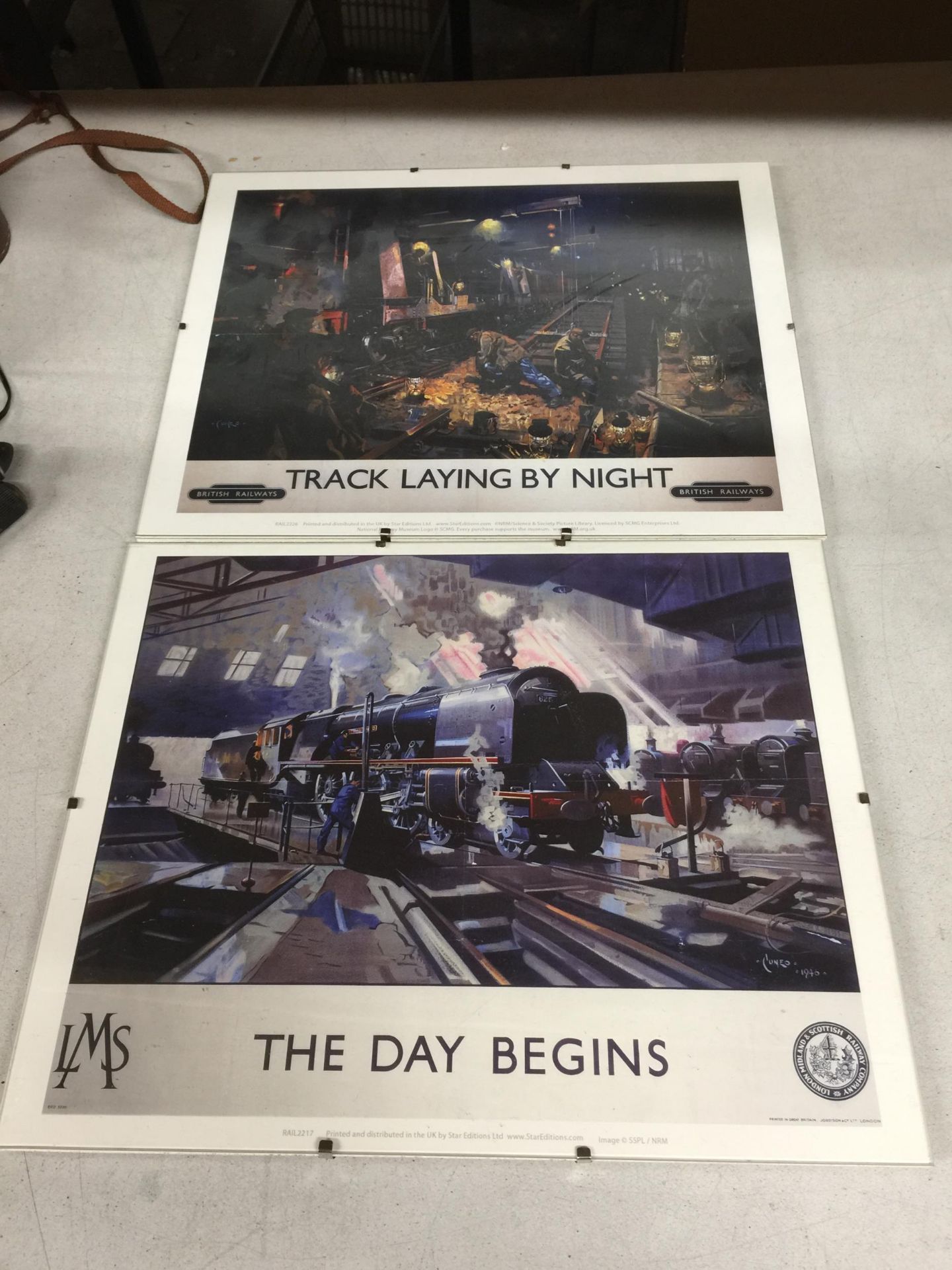 TWO UNFRAMED TRAIN POSTERS
