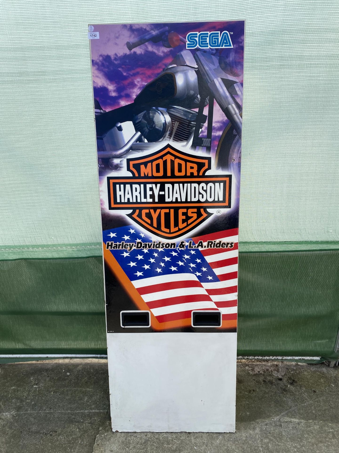 A HARLEY DAVIDSON ADVERTISING SIGN