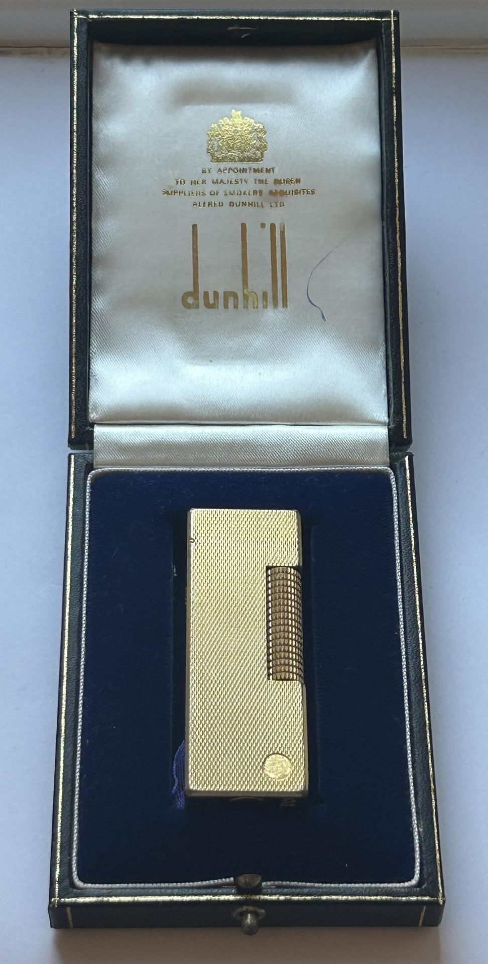 A DUNHILL GOLD PLATED POCKET LIGHTER COMPLETE WITH ORIGINAL FITTED DUNHILL CASE