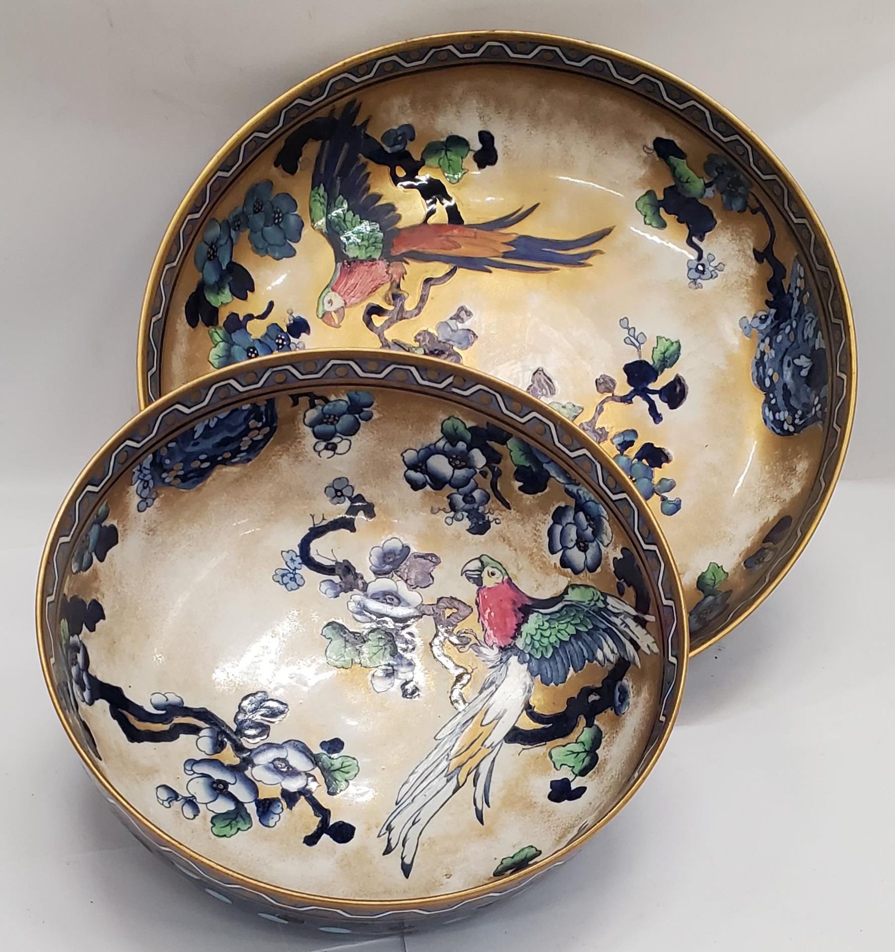 TWO LARGE LOSOL WARE BOWLS DECORATED WITH PARROTS AND FOLIAGE