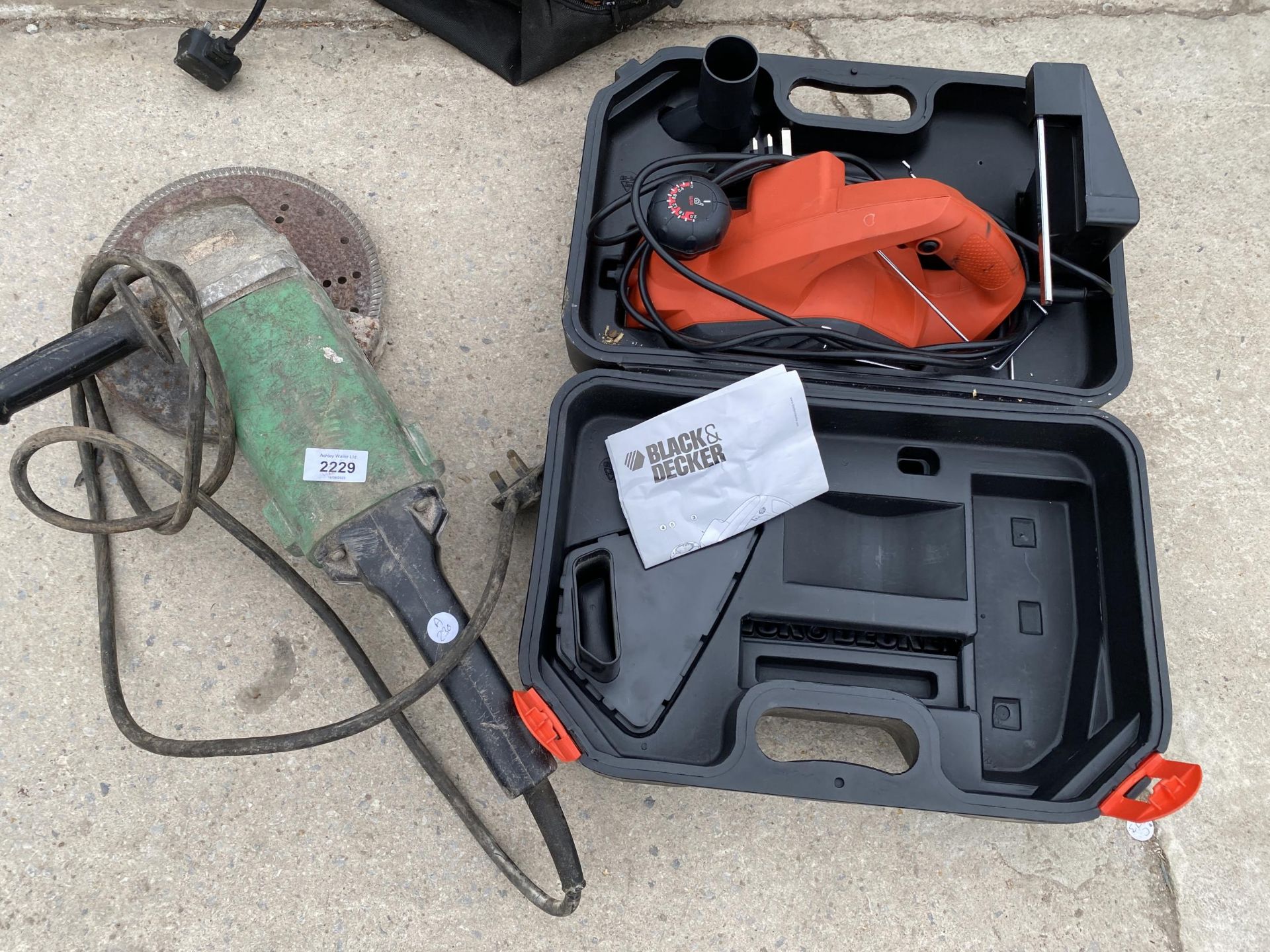 TWO POWER TOOLS, A HITACHI ANGLE GRINDER AND A BLACK AND DECKER PLANER