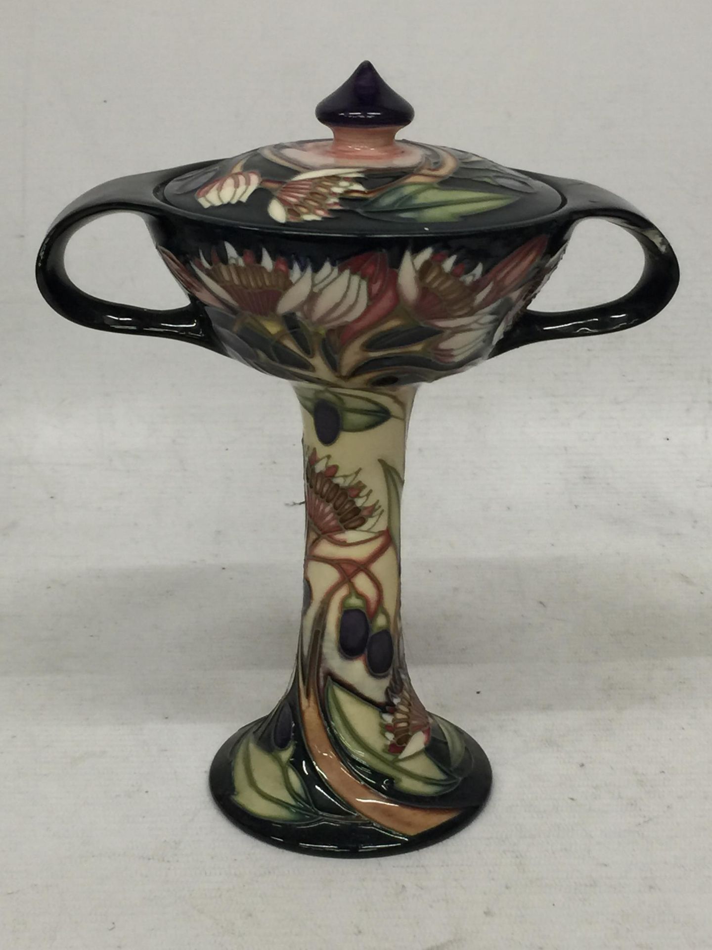 A MOORCROFT POTTERY FLORAL BONBONIERE, DATED 2003 (HANDLE A/F)